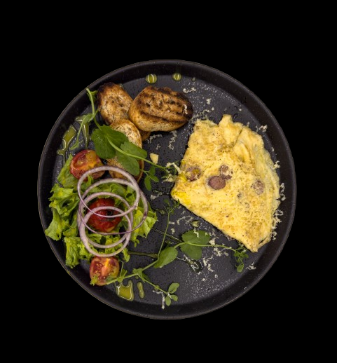 Traditional peasant omelette served with sautéed mushrooms.